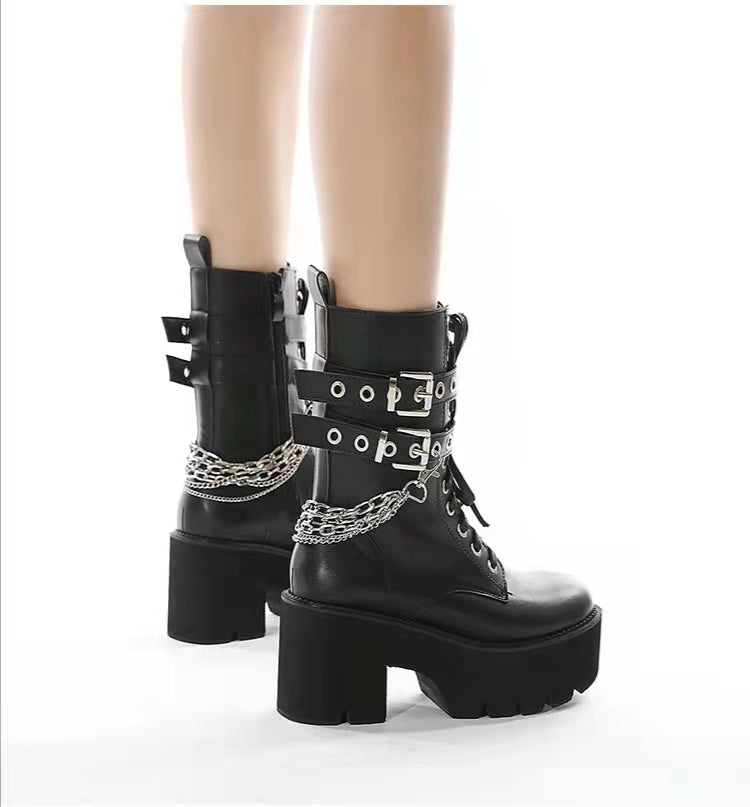 Boots with clearance chains and buckles